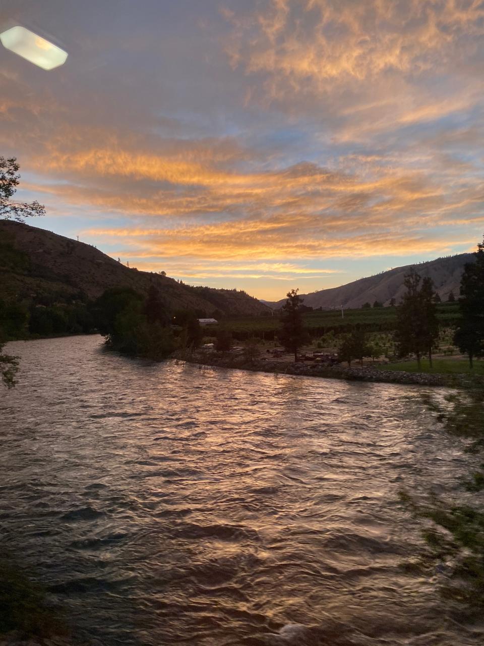 Sunset by the Wenatchee River in Washington, as captured by a fellow passenger.