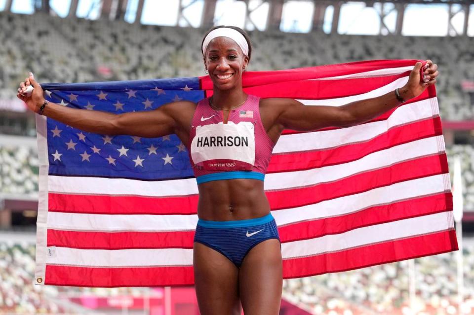 Kendra “Keni” Harrison, of the United States, celebrates after her second place finish in the women’s 100-meters hurdles final at the 2020 Summer Olympics, Monday, Aug. 2, 2021, in Tokyo.