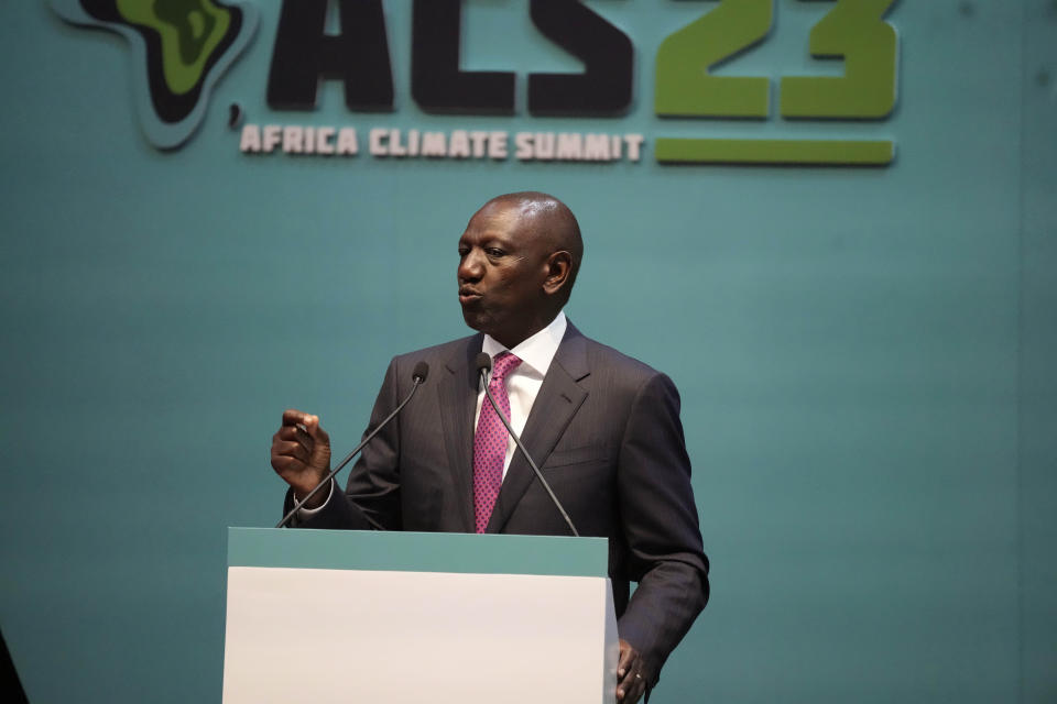 Kenyan President William Ruto, addresses delegates during the official opening of the Africa Climate Summit at the Kenyatta International Convention Centre in Nairobi, Kenya, Monday, Sept. 4, 2023. The first African Climate Summit opened with heads of state and others asserting a stronger voice on a global issue that affects the continent of 1.3 billion people the most, even though they contribute to it the least. (AP Photo/Khalil Senosi)