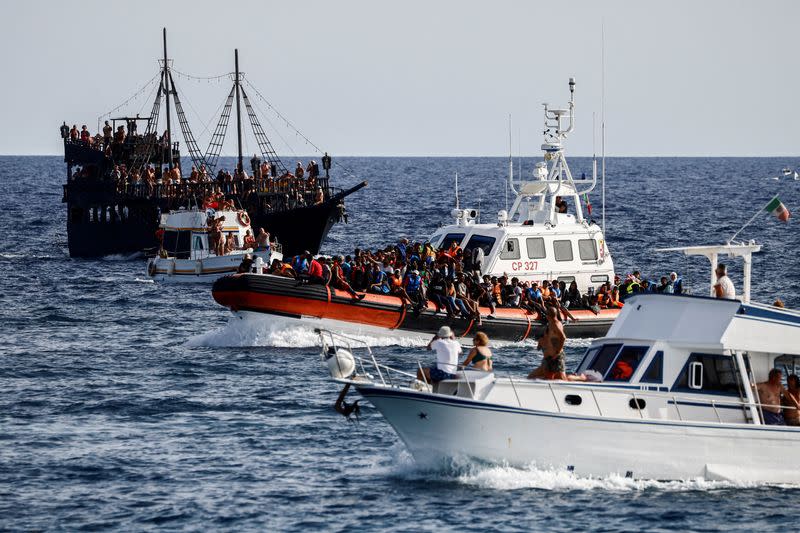 FILE PHOTO: Migrants in Lampedusa