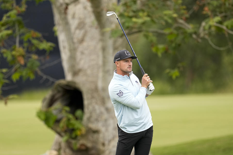 Bryson DeChambeau watches his shot on the second hole during the first round of the U.S. Open golf tournament at Los Angeles Country Club on Thursday, June 15, 2023, in Los Angeles. (AP Photo/George Walker IV)