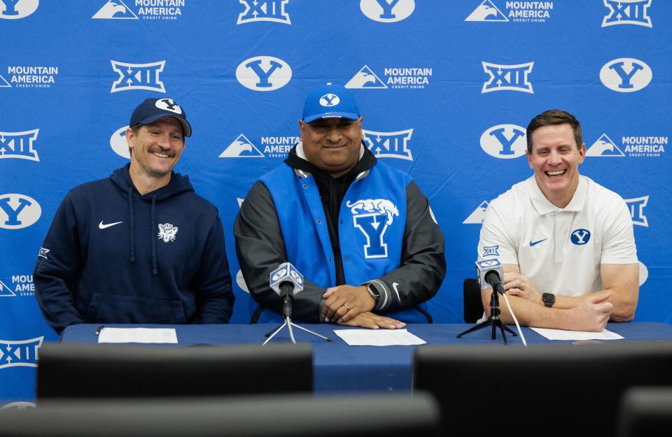 BYU head coach Kalani Sitake, center, is flanked by offensive coordinator Aaron Roderick, left, and defensive coordinator Jay Hill Wednesday, Dec. 20, 2023, in Provo. | BYU Photo