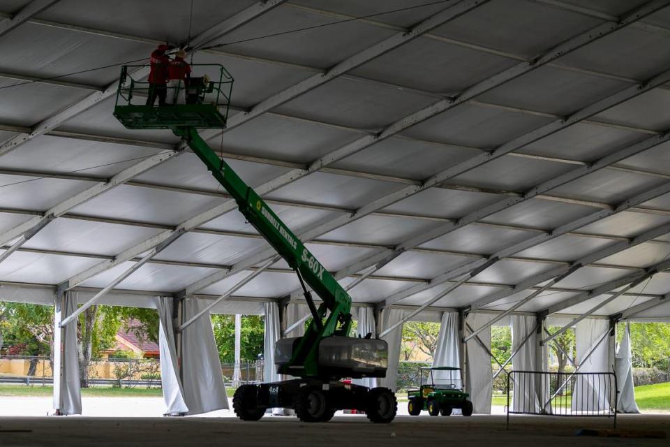 Construction crews assemble a 250-bed field hospital at Miami-DadeÕs fairgrounds in Westchester, Florida on Tuesday, March 24, 2020. The hospital is being built in preparation for a surge of coronavirus cases.