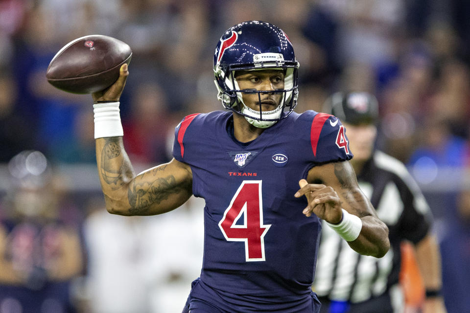 HOUSTON, TX - DECEMBER 1:  Deshaun Watson #4 of the Houston Texans throws a pass during the first half of a game against the New England Patriots at NRG Stadium on December 1, 2019 in Houston, Texas.   (Photo by Wesley Hitt/Getty Images)