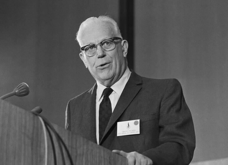 Earl Warren speaks to the President's Commission for the Observance of Human Rights Year 1968 meeting in Washington, Dec. 4, 1968. He will stay on as Chief Justice through the Supreme Court term. President-elect Richard Nixon he will choose a successor to Warren, who resigned earlier this year, after the court term ending in June. (AP Photo/Byron Rollins)