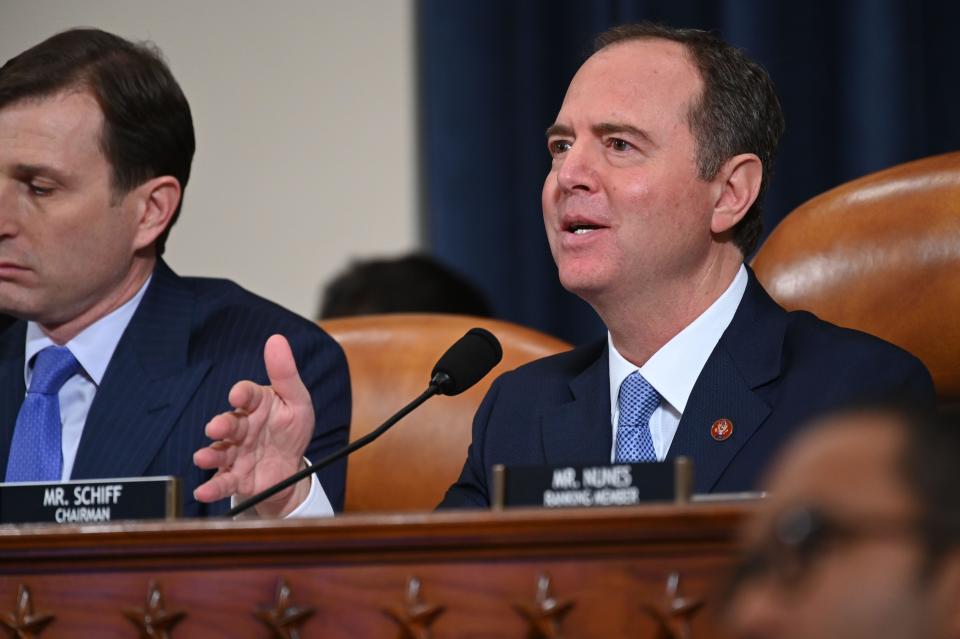 House Intelligence Committee Chairman Adam Schiff, D-Calif., asks former National Security Council official Fiona Hill and State department official David Holmes questions as they testify in a public hearing in the impeachment inquiry into allegations President Donald Trump pressured Ukraine to investigate his political rivals on Capitol Hill in Washington, Nov. 21, 2019.