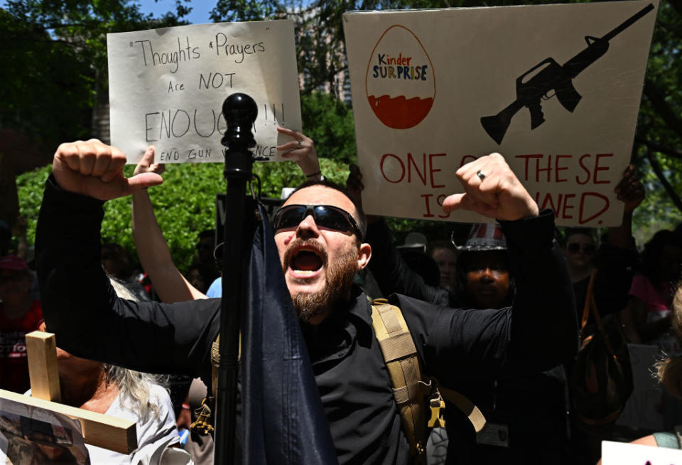 A man protests gun laws in America