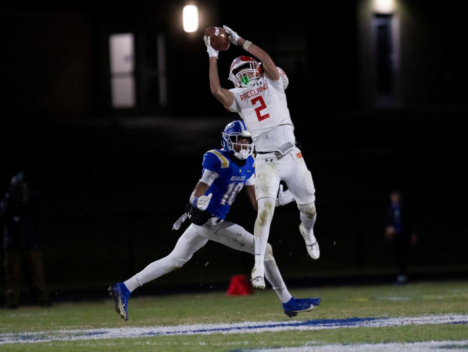 Nov 24, 2023; Louisville, KY, USA; Raceland running back Noah Wallace (2) jumps for a pass during the first half of the KHSAA Class A state semifinal game against KCD at Kentucky Country Day. Mandatory Credit: Michelle Hutchins-The Courier-Journal