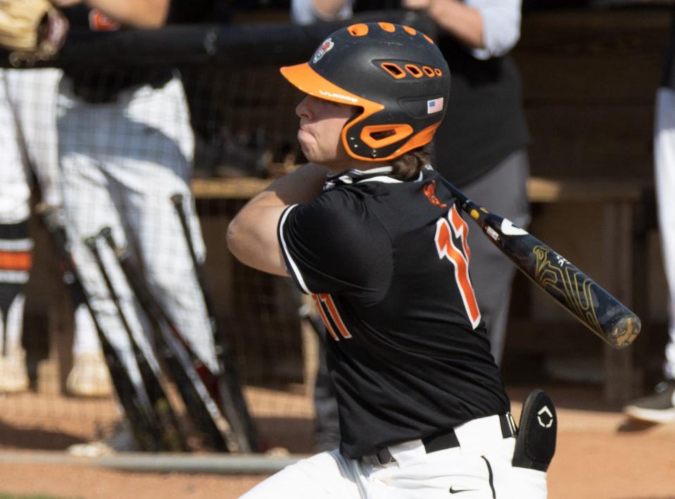 Hoover’s Nick Vardavas hits a two-run double in the bottom of the second inning against Kent Roosevelt in a Division I sectional final, Thursday, May 20, 2021. (Bob Rossiter / Repository)