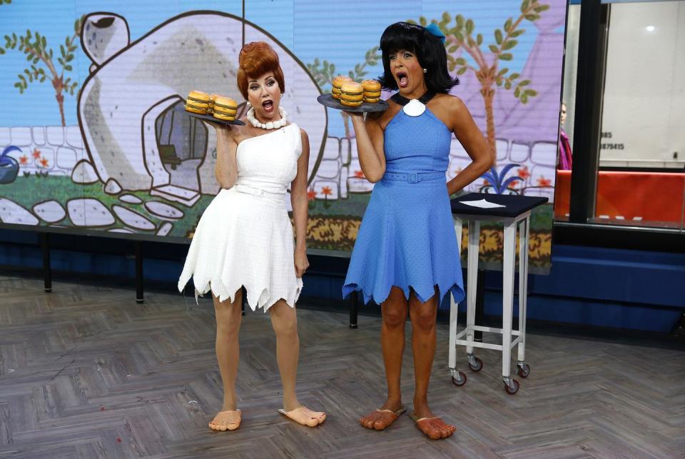 <p>Yaabaa-dabba-doo! For 2013's classic TV show theme, Hoda and Kathie Lee channeled the modern Stone Age family as BFFs Wilma and Betty. Just check out those <em>Flintstone</em> feet – talk about nailing it!</p>