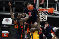 Baylor's Jonathan Tchamwa Tchatchoua (23) has his shot blocked by Illinois' Kofi Cockburn (21) during the first half of an NCAA college basketball game, Wednesday, Dec. 2, 2020, in Indianapolis. (AP Photo/Darron Cummings)