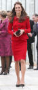 <p> This is another royal rewear, with Kate first wearing the red Luisa Spagnoli suit in February of 2011 (although that dress was shorter, so the skirt might be different in this iteration). The colors correspond with local colors of Canterbury (red and black); Kate and William were there to honor the earthquake victims of Christchurch. Kate also wore a Mulberry clutch and Episode Angel black pumps (unlike the first time she wore this outfit, with black tights and boots). </p>