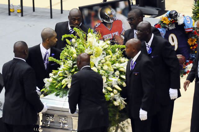 <p>George Clark/Pool/AP</p> The funeral of Steve McNair on July 11, 2009.