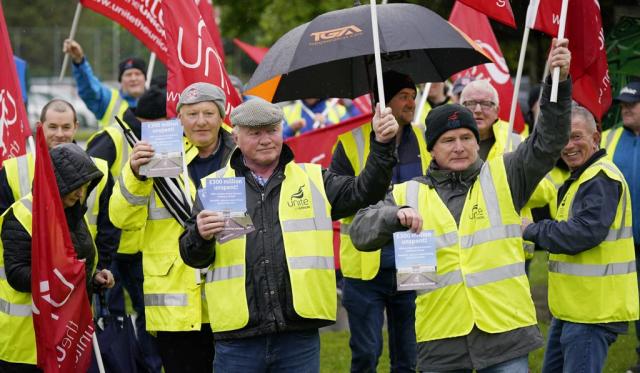 Striking council workers protest outside the Northern Ireland Assembly election count centre at Meadowbank Sports arena in Magherafelt in Co Londonderry (Niall Carson/PA) (PA Wire)