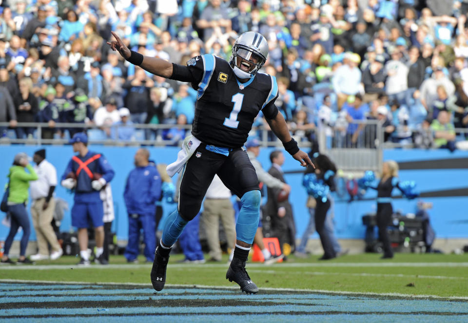 Carolina Panthers' Cam Newton (1) celebrates a touchdown against the Seattle Seahawks during the second half of an NFL football game in Charlotte, N.C., Sunday, Nov. 25, 2018. (AP Photo/Mike McCarn)