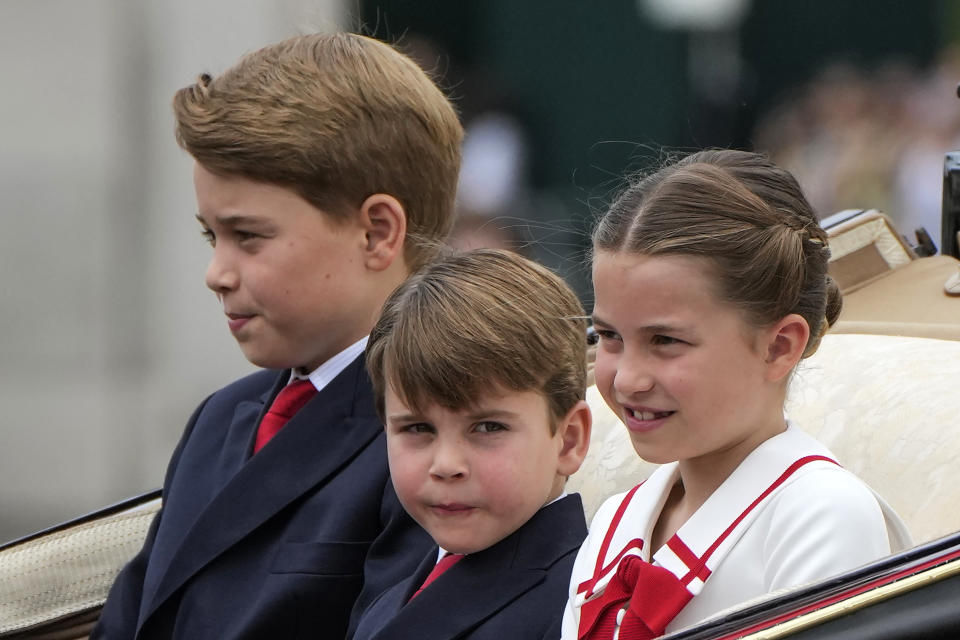 From left: Prince George, Prince Louis and Princess Charlotte leave Buckingham Palace to take part in the Trooping The Colour parade, in London, Saturday, June 17, 2023. Trooping the Colour is the King's Birthday Parade and one of the nation's most impressive and iconic annual events attended by almost every member of the Royal Family.(AP Photo/Alastair Grant)