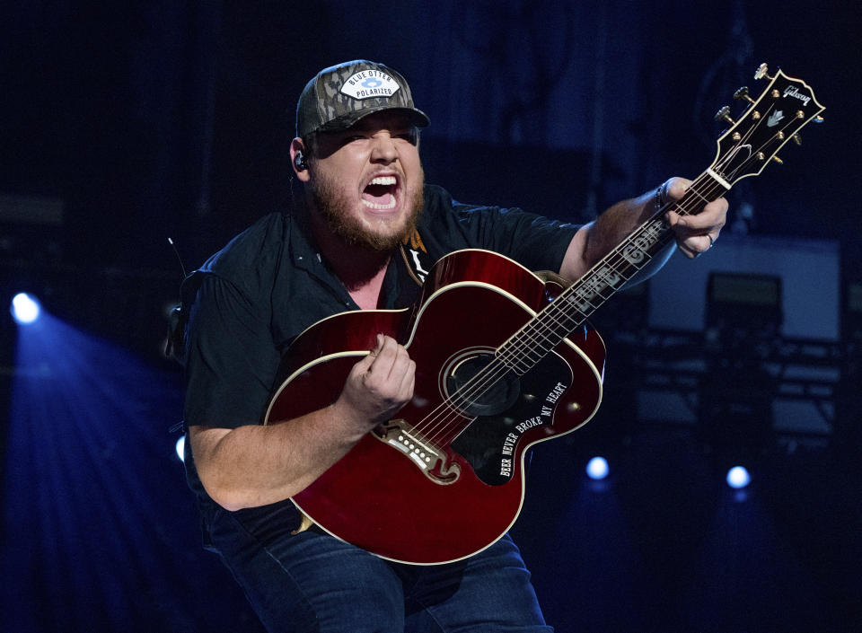 FILE - Luke Combs performs during CMA Fest 2022 in Nashville, Tenn., on June 11, 2022. Combs' cover of "Fast Car" is one of AP's contenders for song of the summer. (Photo by Amy Harris/Invision/AP, File)