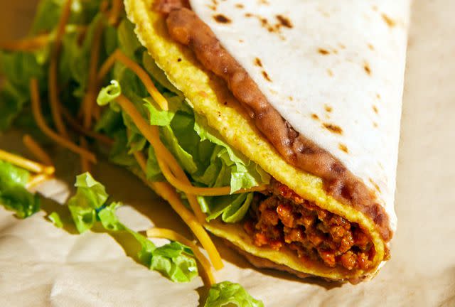 <p>Courtesy of Taco Bell</p> Taco Bell's Double Decker Taco, as well as the Double Decker Taco Supreme, will be available nationwide from October 10–30.