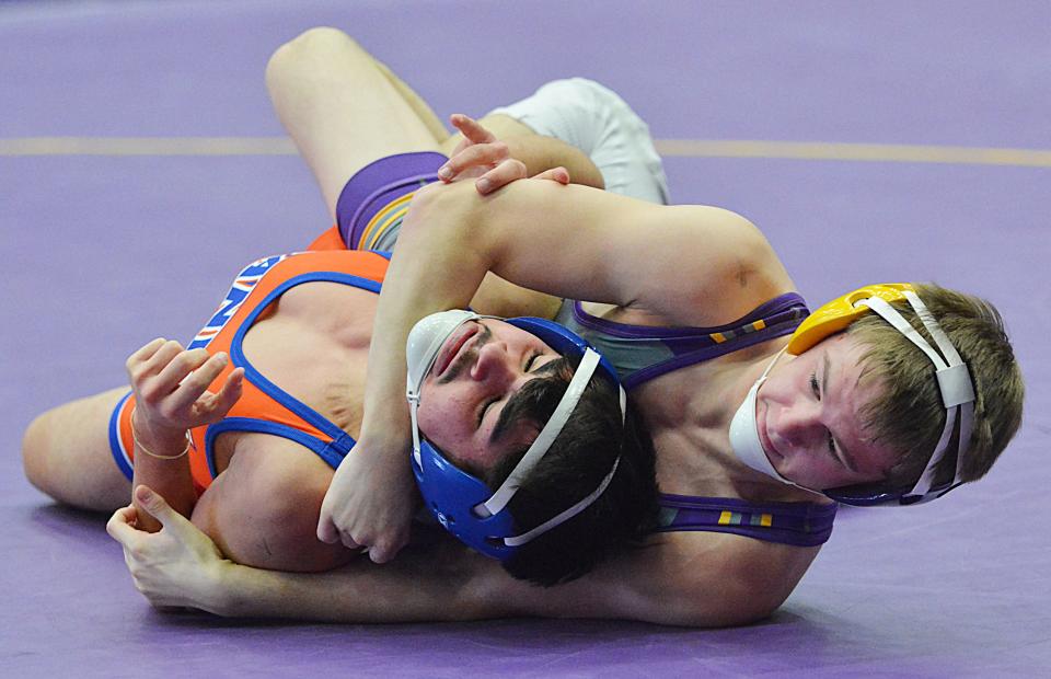 Watertown's Sloan Johannsen puts Canby's Issac Guzman on his back during their 126-pound match in the Marv Sherrill Dual wrestling tournament on Saturday, Dec. 2, 2023 in the Watertown Civic Arena.