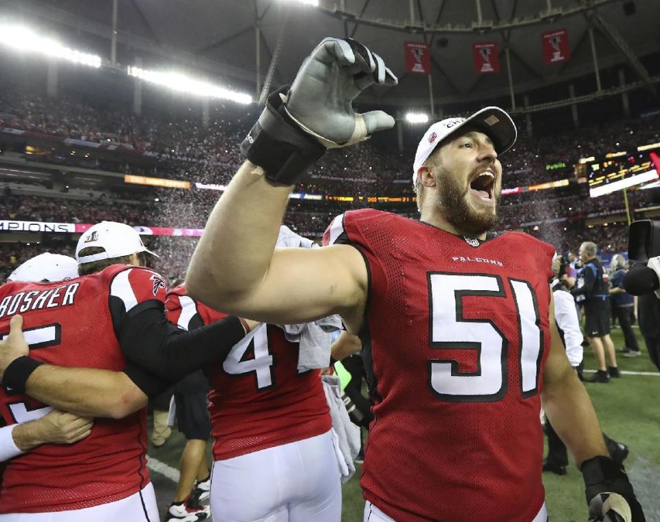 Atlanta Falcons' Alex Mack celebrates defeating the Green Bay Packers 44-21 in the NFL football NFC Championship game to advance to the Super Bowl, Sunday, Jan. 22, 2017, in Atlanta. (Curtis Compton/Atlanta Journal-Constitution via AP)