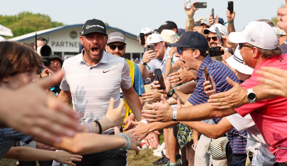   Block shouts as he walks through the crowds at the PGA Championship 