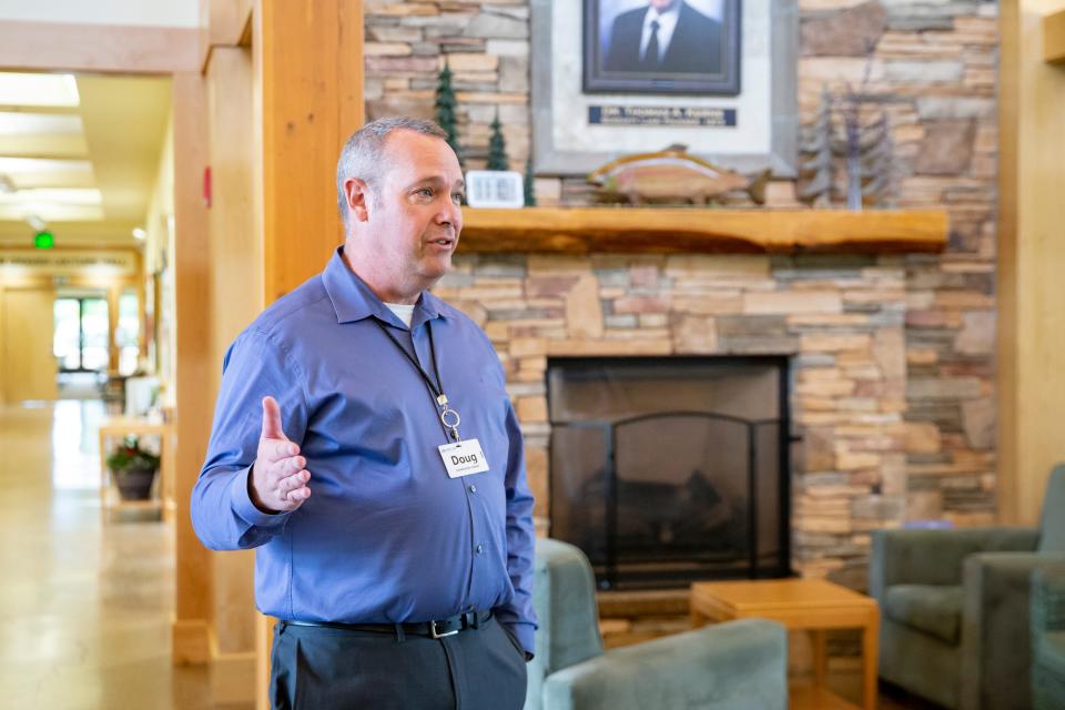 Serenity Lane community liaison Doug Smith speaks during a tour of the organization’s Coburg campus May 3.