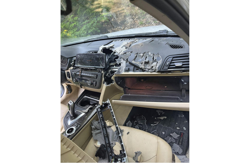 This July 15, 2024, photo shows the damage caused by a bear and cub that broke into a car, and became trapped inside in Winsted, CT, until freed by state environmental conservation police. It turned out to be the first of three episodes involving bears in Connecticut over six days that were publicly reported by the state Department of Energy and Environmental Protection — another sign of the increasing black bear population in the state. (AP Photo)