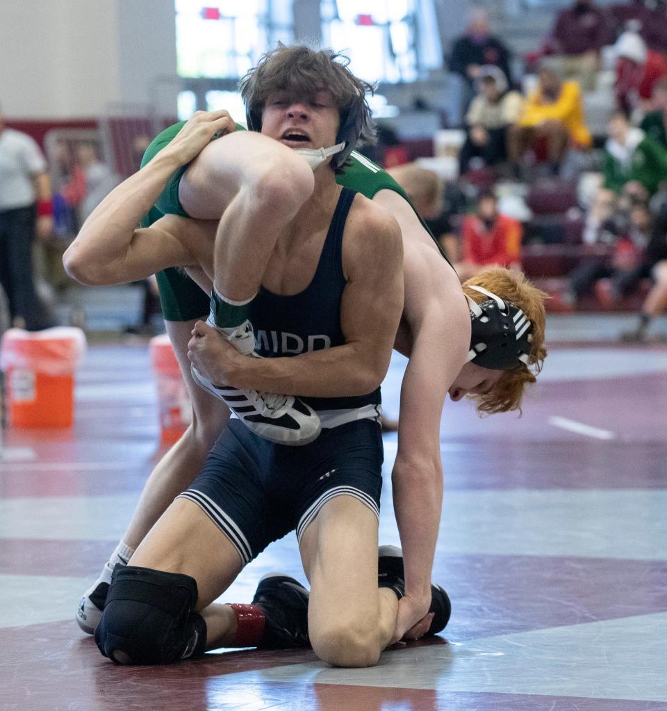 Middletown South's Jack Zalesk, shown lifting Camden Catholic's Jackson Young during an NJSIAA 120-pound pre-quarterfinal-round bout last April 24 at Phillipsburg High School, will move up to 126 pounds this season.