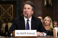 <p>Supreme Court nominee Brett Kavanaugh faces the Senate Judiciary Committee in September 2018.</p> <p>During his tenure, Trump appointed three conservative Supreme Court justices to take seats vacated by Antonin Scalia, Anthony Kennedy and Ruth Bader Ginsburg. Nominee Kavanaugh, Trump's second appointee, faced intense scrutiny from the Senate Judiciary Committee after accusations of sexual misconduct surfaced from high school acquaintance Christine Blasey Ford. Ford <a href="https://people.com/politics/christine-blasey-ford-brett-kavanaugh-testify-sexual-assault-allegations/" rel="nofollow noopener" target="_blank" data-ylk="slk:testified against;elm:context_link;itc:0;sec:content-canvas" class="link ">testified against</a> Kavanaugh — <a href="https://people.com/politics/christine-blasey-ford-brett-kavanaugh-testimony-death-threats-cant-go-home/" rel="nofollow noopener" target="_blank" data-ylk="slk:despite threats;elm:context_link;itc:0;sec:content-canvas" class="link ">despite threats</a> to her safety for doing so — but ultimately, <a href="https://people.com/politics/brett-kavanaugh-confirmed-supreme-court-sexual-assault-allegations-vote/" rel="nofollow noopener" target="_blank" data-ylk="slk:Kavanaugh was confirmed;elm:context_link;itc:0;sec:content-canvas" class="link ">Kavanaugh was confirmed</a> by an exceptionally narrow Senate margin.</p>