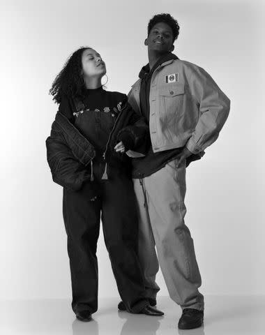 <p>Getty Images</p> Rapper Special Ed and a model pose in a 1994 J. Crew ad.