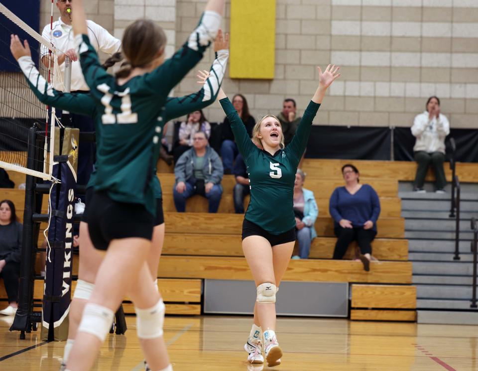 Abington's Caroline Morrell celebrates a point during a game versus East Bridgewater on Wednesday, Oct. 13, 2022.