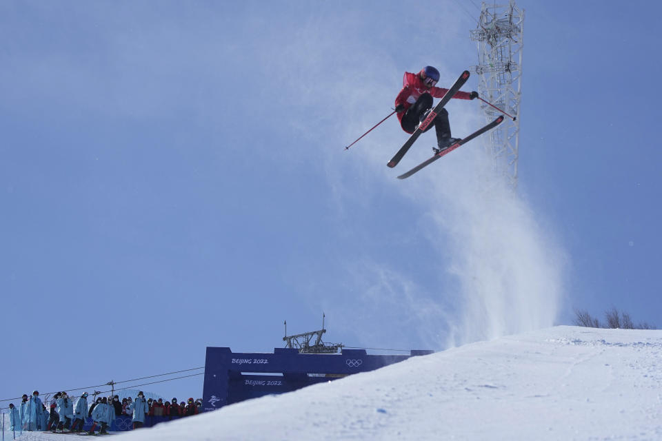 China's Eileen Gu competes during the women's halfpipe finals at the 2022 Winter Olympics, Friday, Feb. 18, 2022, in Zhangjiakou, China. (AP Photo/Gregory Bull)