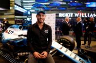 Israeli racing driver Roy Nissany poses for a photo after signing with British Formula One motor racing team Williams in Tel Aviv