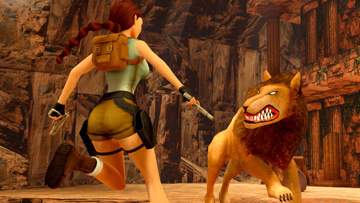  Lara Croft from Tomb Raider 1-3 Remastered goes toe-to-toe with a fierce lion. 