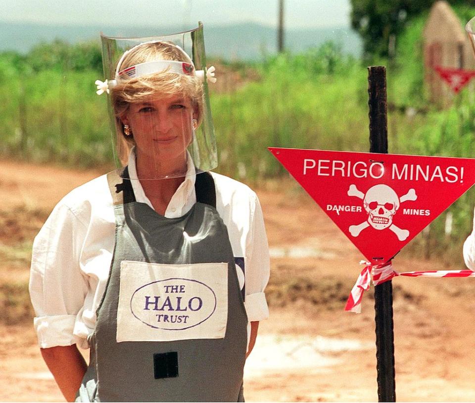 Diana, Princess of Wales, wears body armor during a visit to a landmine in January 1997 in Angola. | Anwar Hussein Collection—Getty Images