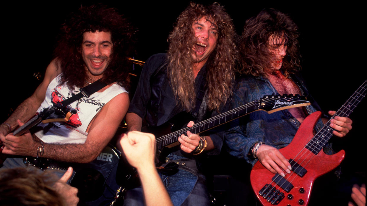  Paul Taylor, Kip Winger, and Reb Beach, all of the group Winger, perform onstage at the Poplar Creek Music Theater, Hoffman Estates, Illinois, July 27, 1989. 