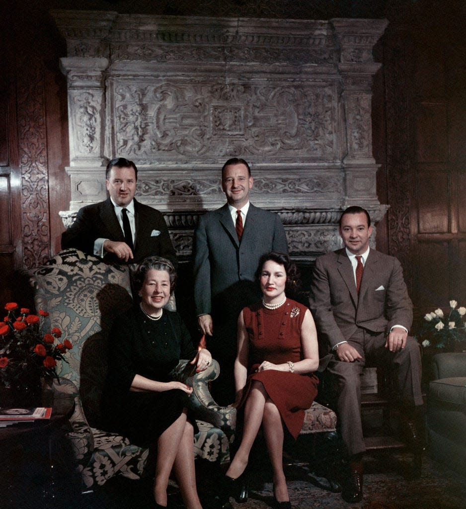 June 1957: Mrs Edsel Ford in her home at Grosse Point Shores, Michigan with her sons, l to r; Henry II (1917 - 1987), Benson and William, and her daughter Josephine, centre.