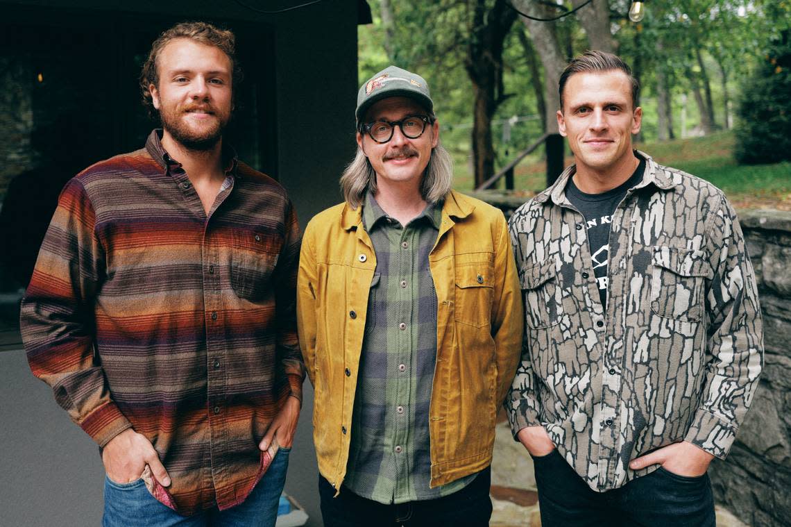 J.T. Cure with Jared and Joshua Revenscraft of New Frontier Outfitters in Morehead. The company has made corduroy hats featuring Cure’s guitar, “Purdy,” that are being sold to raise money for Chris and Morgane Stapleton’s Outlaw State of Kind non-profit. Provided