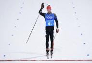 Biathlon - Pyeongchang 2018 Winter Olympics - Men's 4x7.5 km Relay Final - Alpensia Biathlon Centre - Pyeongchang, South Korea - February 23, 2018 - Simon Schempp of Germany finishes. REUTERS/Toby Melville