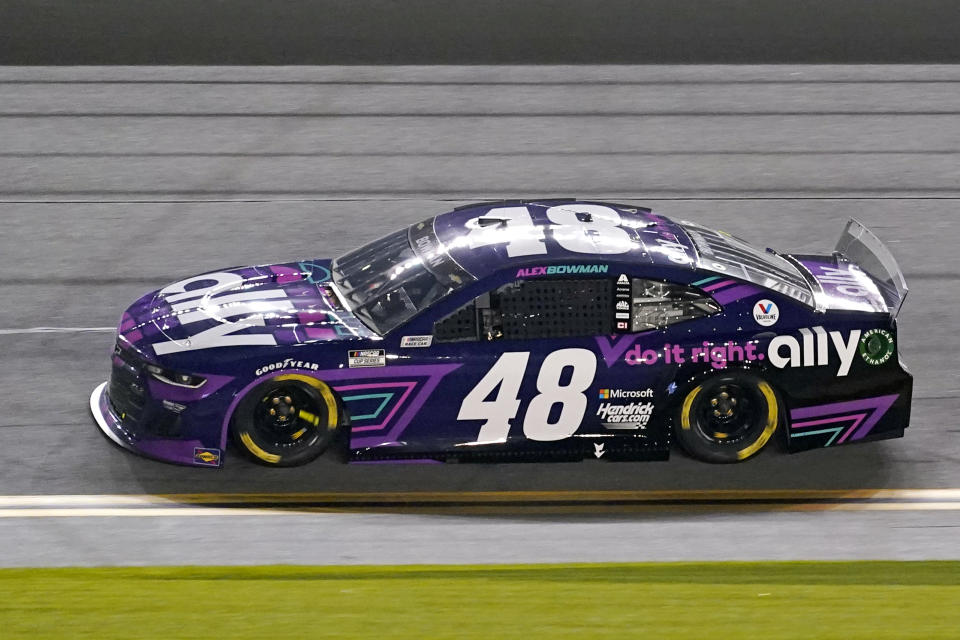 Alex Bowman (48) struggles to keep up with the leaders after he had some mechanical issues early in the first of two qualifying NASCAR auto races for the Daytona 500 at Daytona International Speedway, Thursday, Feb. 11, 2021, in Daytona Beach, Fla. (AP Photo/John Raoux)