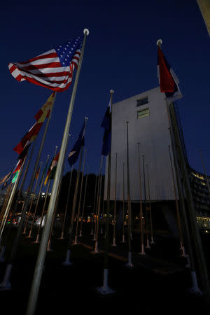 An American flag flies outside the headquarters of the United Nations Educational, Scientific and Cultural Organization (UNESCO) in Paris, France, October 12, 2017. REUTERS/Philippe Wojazer