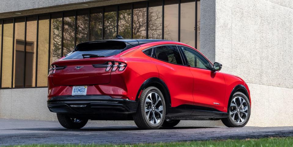 2023 ford mustang mach e parked outside a business