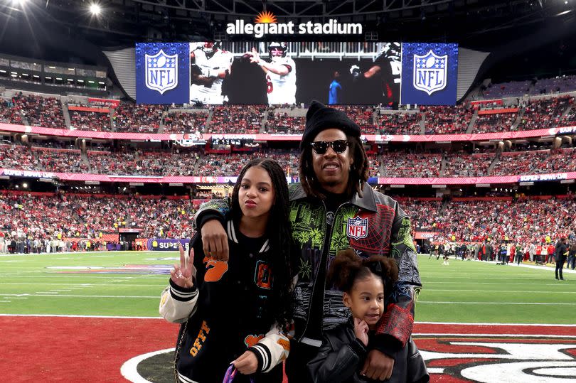 Blue Ivy Carter, Jay-Z and Rumi Carter attend the Super Bowl LVIII Pregame