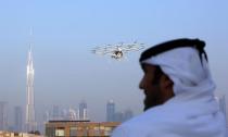 A man looks on as the flying taxi is seen in Dubai, United Arab Emirates September 25, 2017. REUTERS/Satish Kumar