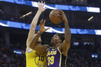 Los Angeles Lakers center Dwight Howard (39) shoots against Golden State Warriors forward Dragan Bender during the first half of an NBA basketball game in San Francisco, Thursday, Feb. 27, 2020. (AP Photo/Jeff Chiu)