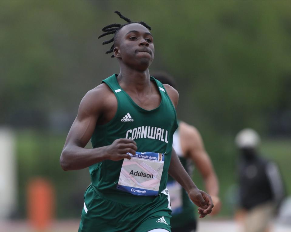 Cornwall's Jiles Addison runs in the 200-meter dash during Day 2 of the Loucks Games track and field meet at White Plains High School on Friday, May 13, 2022.