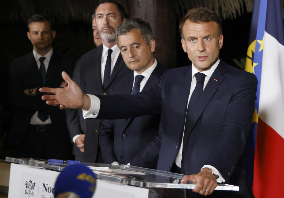 French President Emmanuel Macron delivers a speech at New Caledonia's High Commissioner residency in Noumea, France's Pacific territory of New Caledonia Thursday May, 23, 2024. French President Emmanuel Macron pushed Thursday on a visit to riot-hit New Caledonia for the removal of protesters' barricades and said police sent in to help battle deadly unrest in the French Pacific archipelago "will stay as long as necessary," even as security services back in France focus in coming weeks on safeguarding the Paris Olympics. (Ludovic Marin, Pool via AP)