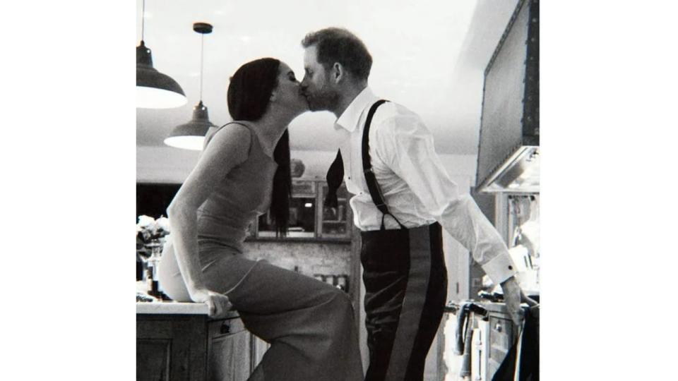 Meghan and Harry kiss inside Frogmore Cottage kitchen