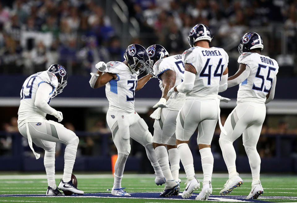 Tennessee safety Kevin Byard, center, was fined $10,026 for celebrating an interception on the Dallas Cowboys’ star. (Getty Images)