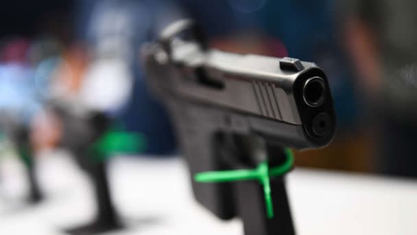 PHOTO: Pistols are displayed during the National Rifle Association (NRA) Annual Meeting at the George R. Brown Convention Center, in Houston, May 28, 2022. (Patrick T. Fallon/AFP via Getty Images)